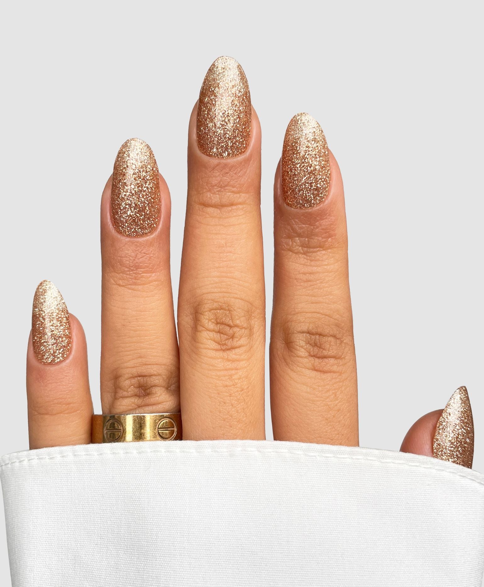 A close-up of a hand featuring the Golden Hour Gel Wrap by Sassy Saints - Brings The Salon Home.