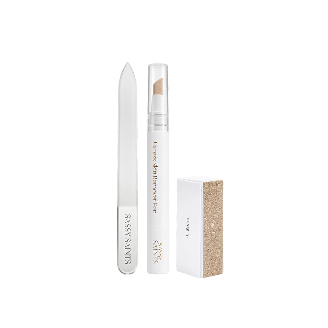 The Sassy Saints Perfect Nail Plate Bundle, consisting of a glass nail file, an excess skin remover pen, and a multi-sided nail buffing block.